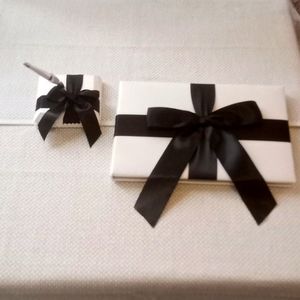 Wedding guest book and pen set.